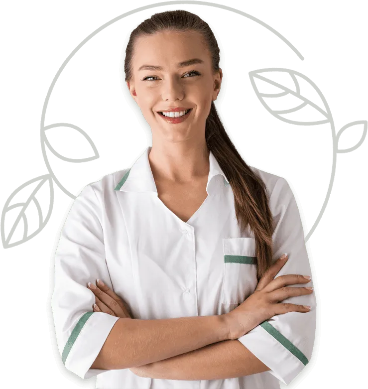 Professionista sanitaria sorridente con camice bianco e foglie